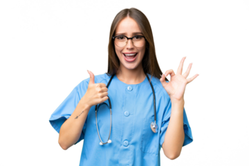 Young nurse caucasian woman over isolated background showing ok sign and thumb up gesture