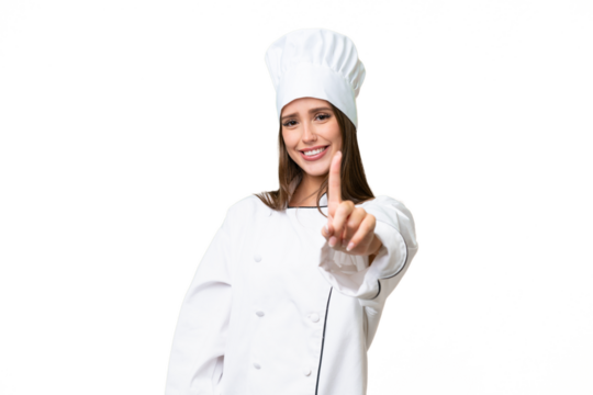 Young chef caucasian woman over isolated background showing and lifting a finger