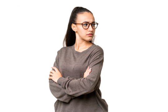 Young Arabian woman over isolated chroma key background keeping the arms crossed