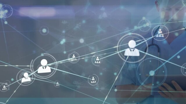 Animation of connected dots and people icons over caucasian male doctor using digital tablet