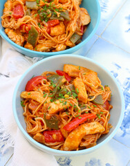 Chicken breast with green beans, bell pepper and noodles