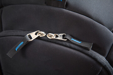 Zipper on sports backpack. Closeup