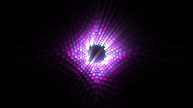 party lights flashing in black background. Predominantly purple color flickering in dots bulb pattern with glow. Disco beams fun for techno or dnb background.