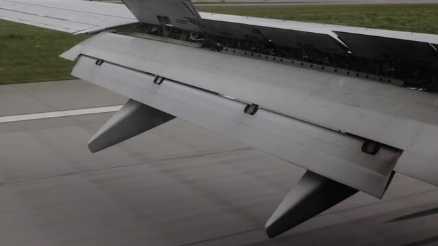 Detail of the aircraft wing during the landing phase