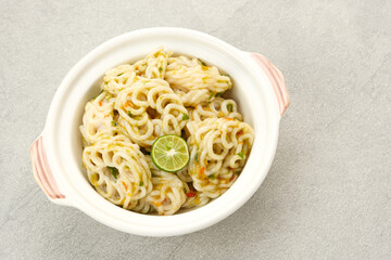 Seblak, stir fried crackers with garlic and chilli. Indonesian traditional food
