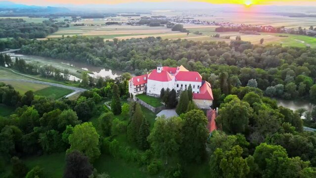 Captivating 4K drone footage of Castle (Grad) Borl, a historic gem with a haunting past as Gestapo Prison in World War Two. Filmed in the stunning sunset time with the view of the surroundings.