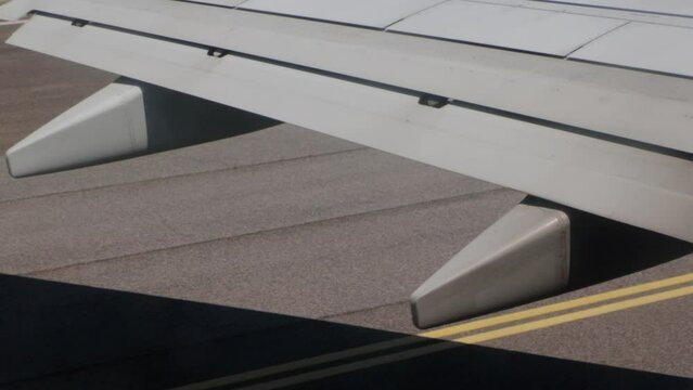 Detail of the aircraft wing during take-off