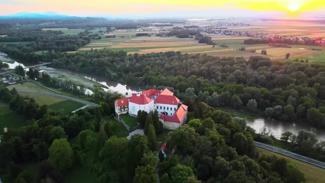 Captivating 4K drone footage of Castle (Grad) Borl, a historic gem with a haunting past as Gestapo Prison in World War Two. Filmed in the stunning sunset time with the view of the surroundings.
