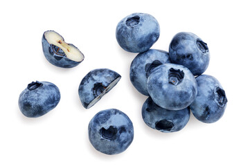 Heap of blueberries with halves and scattered close-up on a white background. Top view