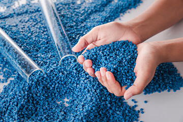 White plastic grain, plastic polymer granules,hand hold Polymer pellets, Raw materials for making...