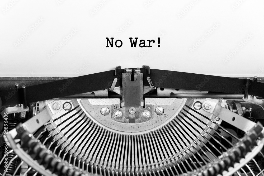 Fototapete no war phrase closeup being typing and centered on a sheet of paper on old vintage typewriter mechan