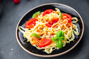 pasta fresh tomato tagliatelle meal food snack on the table copy space food background rustic top view