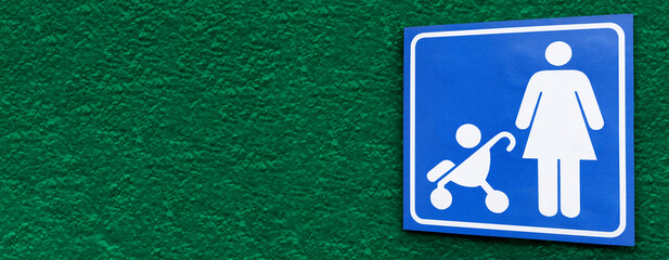 Banner with sign Accessibility for baby pram. Sign indicating descent, lane for people with baby...