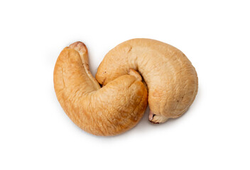 Fototapeta premium Top view of two Roasted brown cashew nuts in stack isolated on white background with clipping path. Close up photo