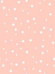 White polka dots on peach pink background