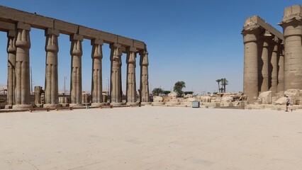 Fototapeta premium The great stone columns and statues in Luxor temple in the East bank in Egypt