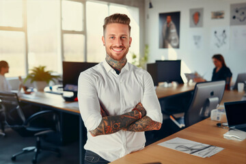 businessman with tattoos in a an office - 625913036