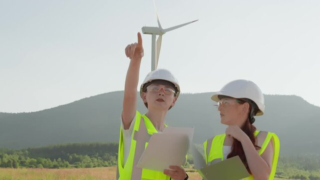 Nature conservation and environmental protection come first. Women scientists devote their careers to development environmental energy wind energy technologies. Progressive analysis wind power plant