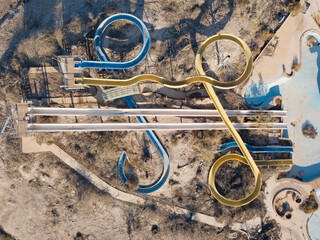 A top down view on a water slides in an abandoned water park 