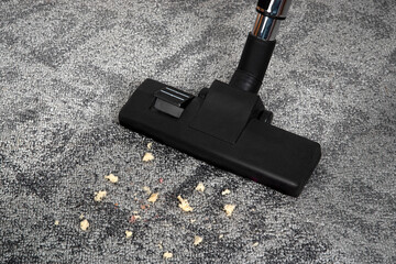 Cleaning concept, vacuum cleaner, on carpeted floor, carpet.