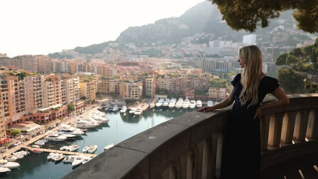 Woman on Vacation Holiday in Monaco, on Overlook Balcony in Port of Fontvielle