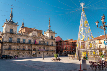 Leon, Spain - November 12 2022: Christmas tree in the city center of Leon in Plaza Mayor Square. 
Streets of Leon decorated with lights and ornaments in anticipation of the Christmas celebration. 