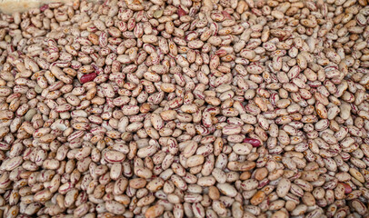 Fresh beans for sale at the local market. Brown beans, close-up.