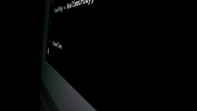 Closeup macro shot movement of coding script moving across LED screen with real-time AI-generated typing, showcasing advanced AI learning in optimization, debug and coding for software development.