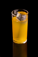 long drink glass with clear ice in the right shape with orange juice