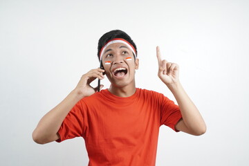 man celebrating independence day calls and comes up with an idea.