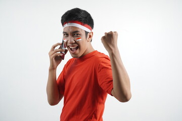 Man celebrating independence is on the phone and win.