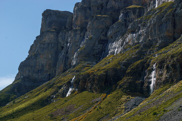 Rocks of the canyon wall with waterfalls in Ordesa y Monte Perdido national park, Huesca, Spain