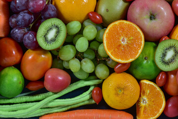 Fresh fruits, assorted fruits, colorful background. Healthy fruits and vegetables concept.