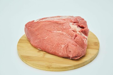 Raw meat on a white background. Pork, beef or lamb. Steak or tenderloin. Different parts of meat products for different dishes.