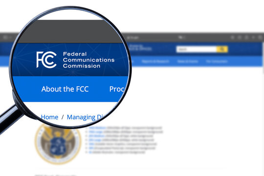 New York, USA - 21 July 2023: Federal Communications Commission FCC logo close-up on website page, Illustrative Editorial.