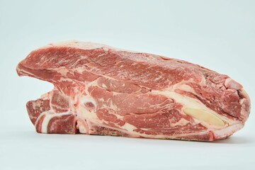 Raw meat on a white background. Pork, beef or lamb. Steak or tenderloin. Different parts of meat products for different dishes.