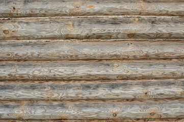 Peasant's  wooden house log wall close up