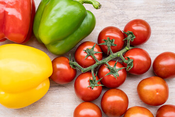 fresh summer cherry tomatoes on a branch