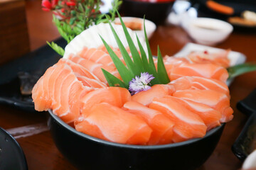 raw salmon, sashimi or sliced salmon