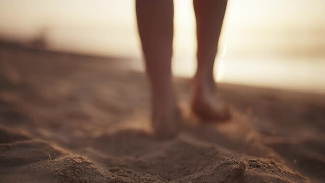 Legs of girl tourist barefooted feet walking on sandy ocean beach in luxury resort at sunset outdoors. Female enjoying resting on summer vacation. Travel, tourism, journey, wanderlust, relax concept.