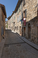Beautiful old mountain village with medieval stone houses in South France