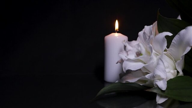 Candle and Lily on black background