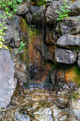 Misty Waterfall And Rocks