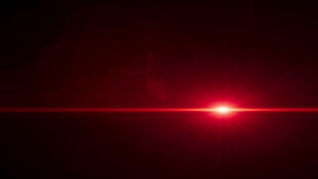 A moving horizontal red laser. Real optical light
