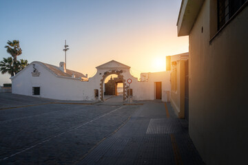 Puerta de la Caleta (La Caleta Gate) at sunset - access to Castle of San Sebastian - Cadiz, Andalusia, Spain