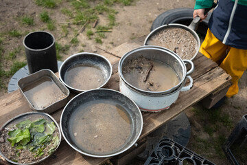 cooking pots with sand in kindergarten