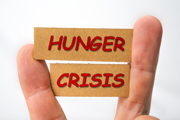 Hunger crisis sign on a white