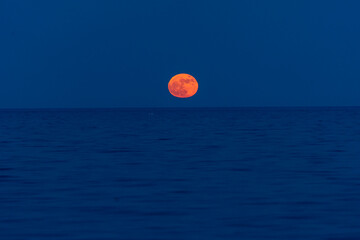 Moon rise over the ocean