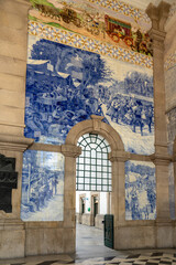 sao bento railway station with beautifully decorated blue and white azulejo tiles in Porto Portugal