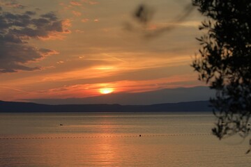 Naklejka na ściany i meble scenic view of the sunset over the adriatic sea